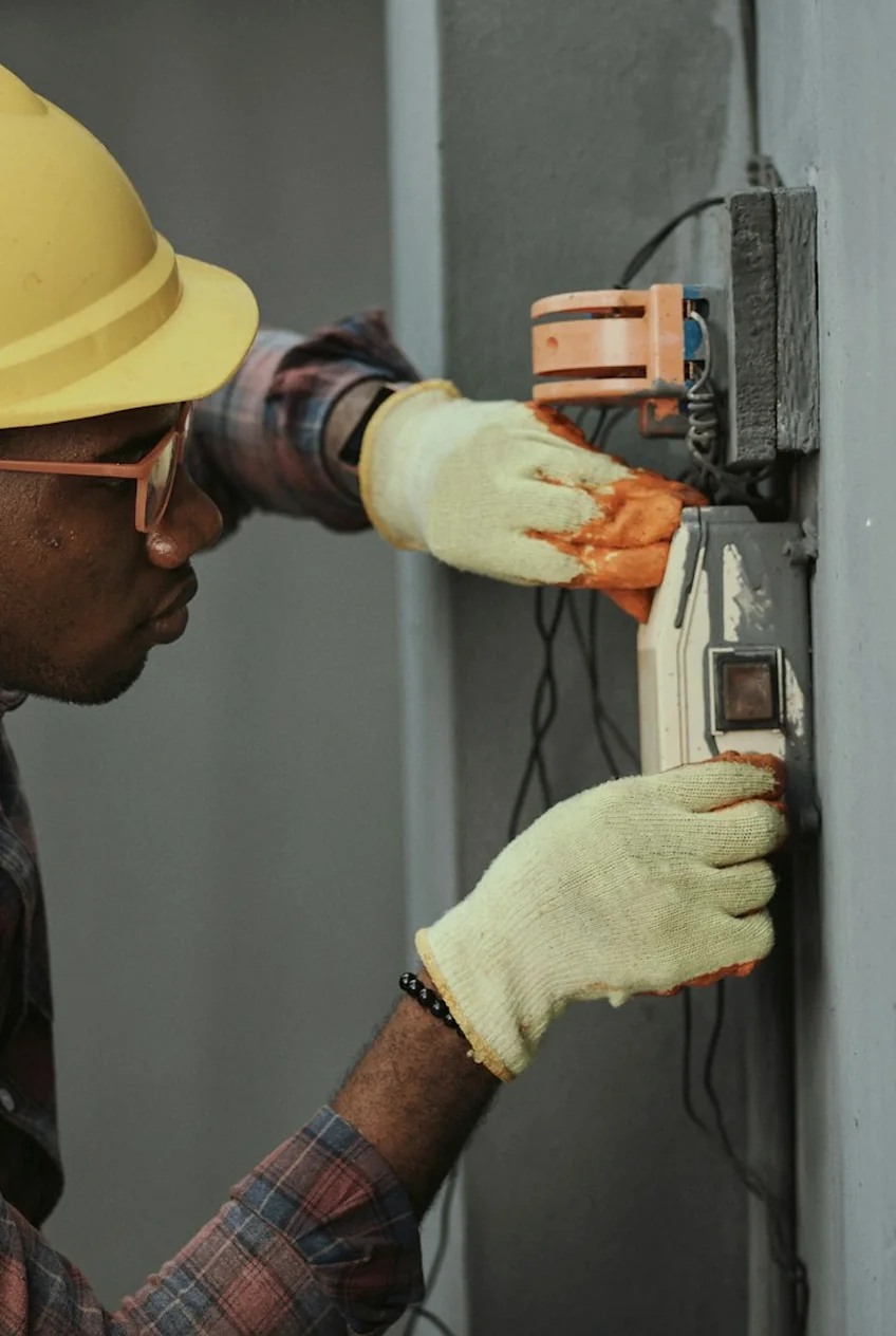 Brightshore electrician working safely on a job site