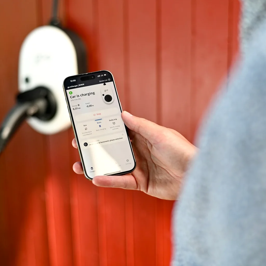 Homeowner using a smart electric vehicle charger