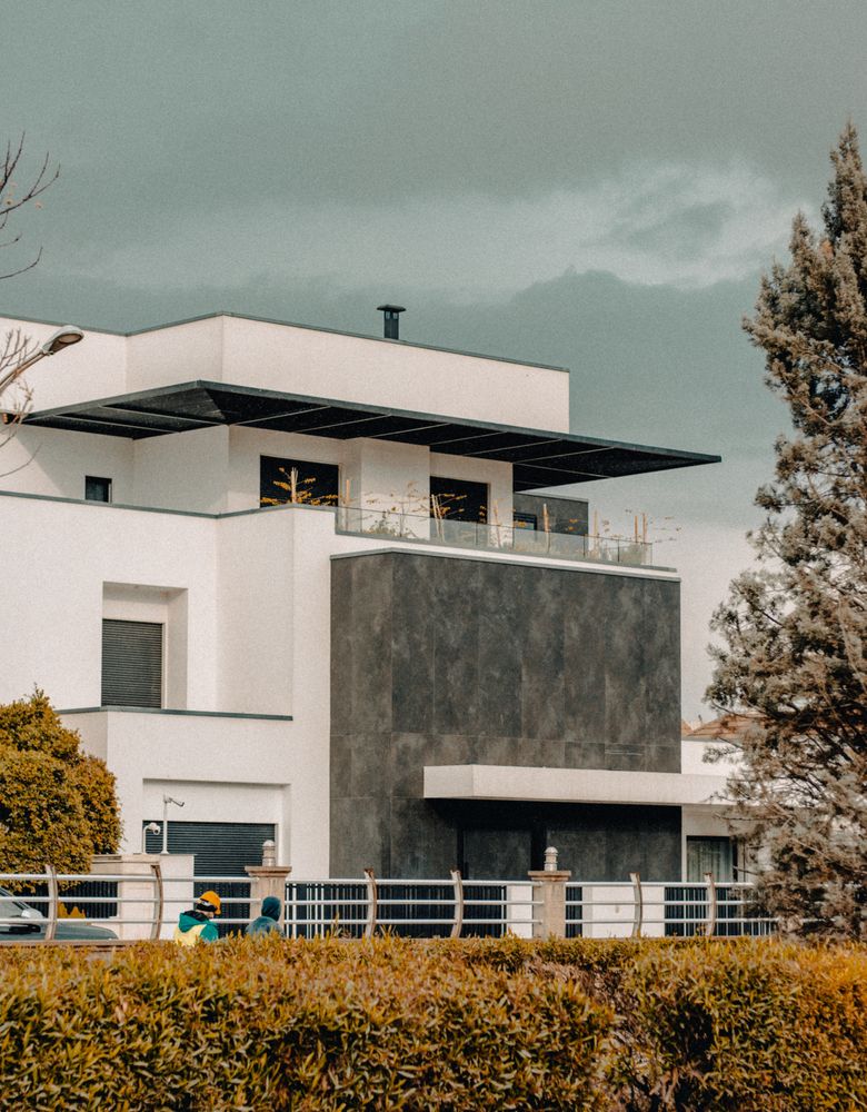 Modern multi-level house with landscaped surroundings
