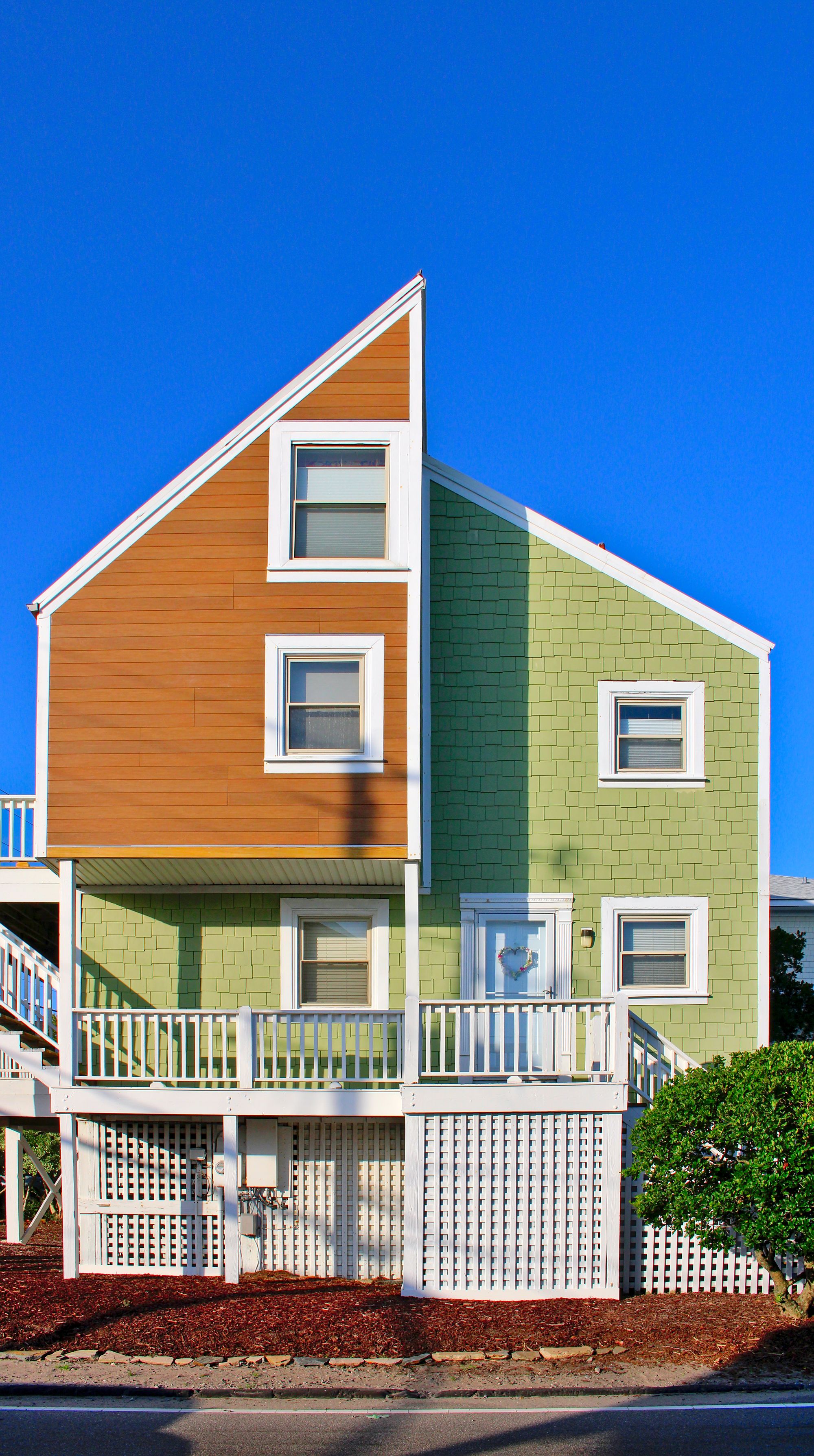 Colorful home and completed gable roof