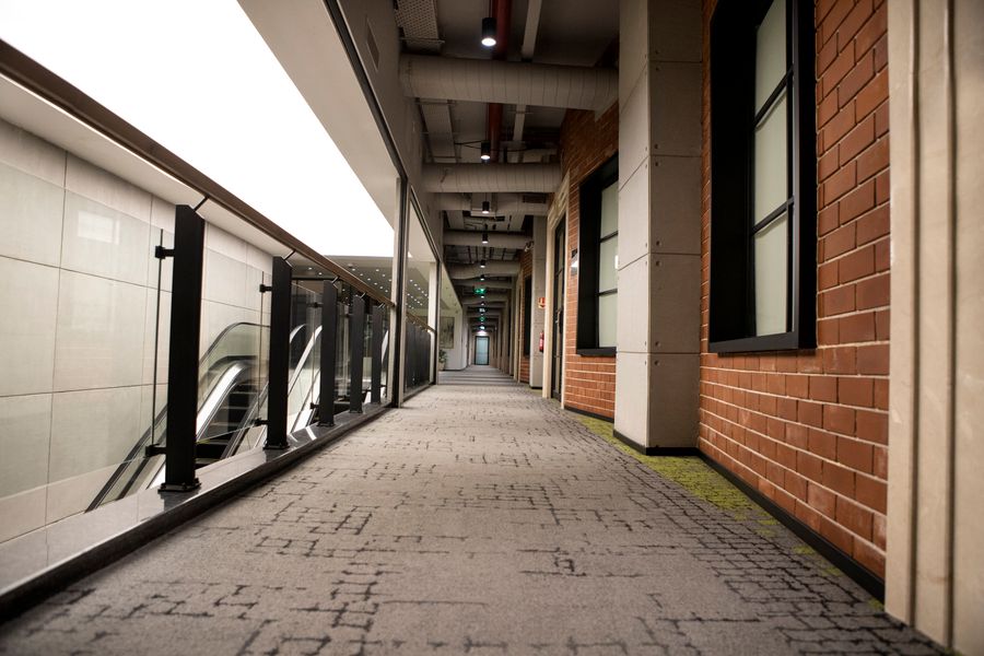 A carpeted corridor in a commercial building