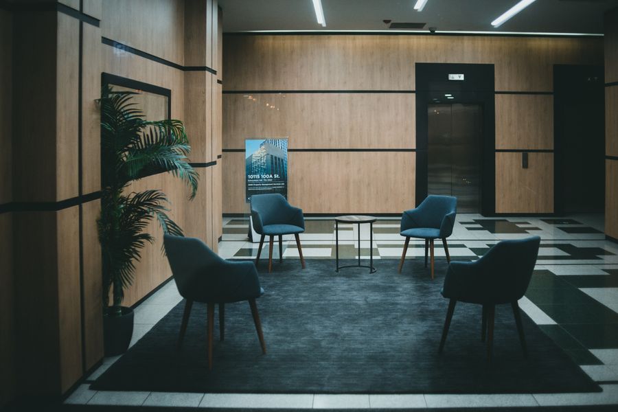 A modern office lobby with seating